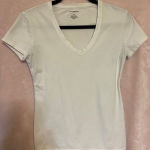 Form fitting white v-neck